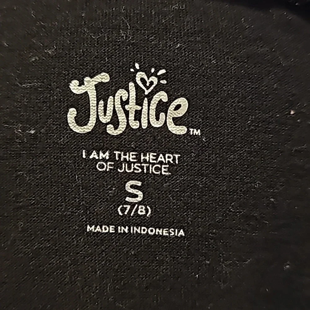 Justice Black T-Shirt. 